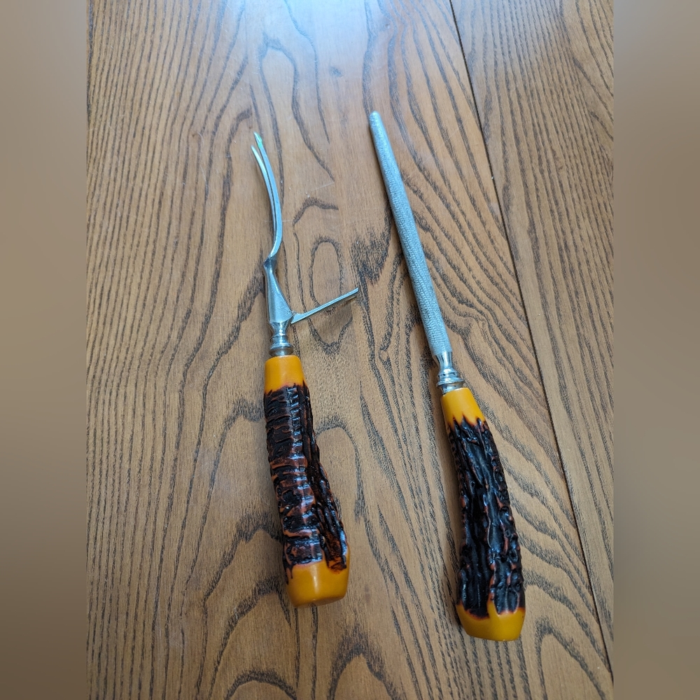 Vintage steel and fork. Stainless steel or steel plated.  Forged steel.